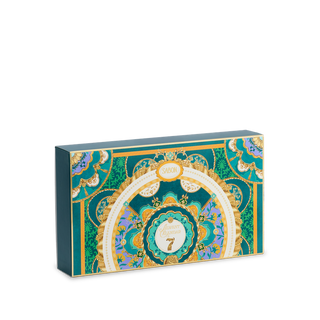 Decorative box with intricate patterns on a white background
